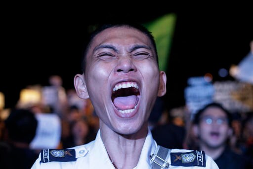 Nude Students, Filipino Activists Protest Dictator's Burial