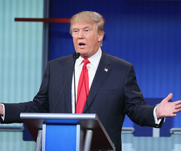 'To Your Knees' Woman: Trump's 'Never Been Disrespectful to Me'