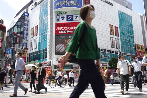 Officials in Tokyo Alarmed as Cases Hit Record Highs