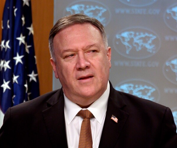 pompeo in a suit and brown tie