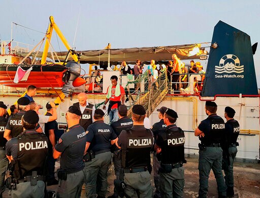 German Rescue Ship Captain Held in Italy Defended at Home