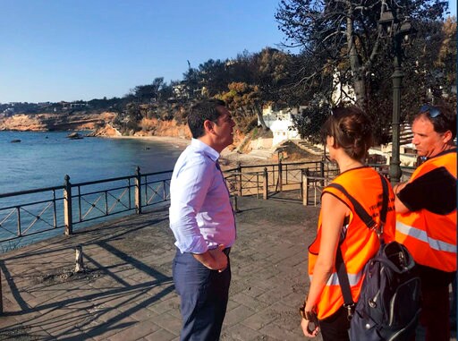 The Latest: Greece: Divers Find Body near site of Wildfire