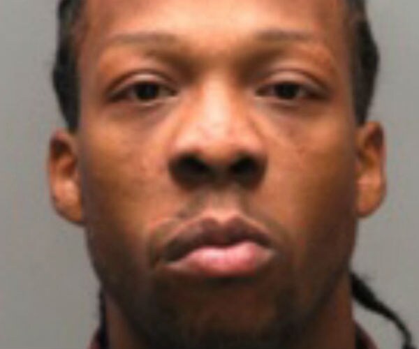 Driver Arrested, Manhunt Continues in Deadly Police Shooting