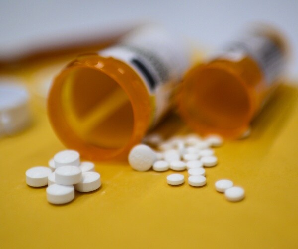 prescription drugs are shown with orange containers