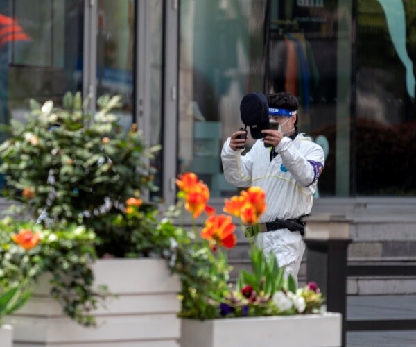 Shanghai Enforcing COVID Lockdown With 'Armed Police,' Residents Say