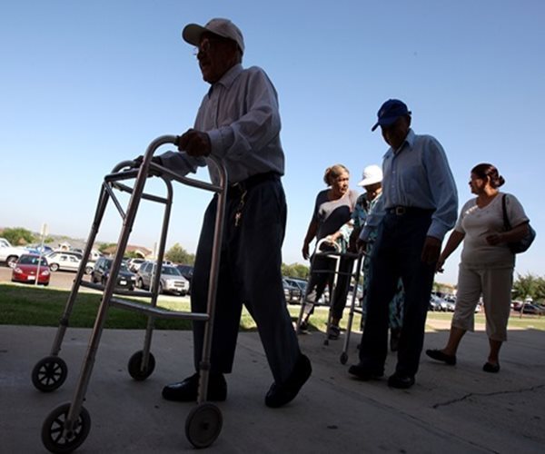 elderly people with walkers