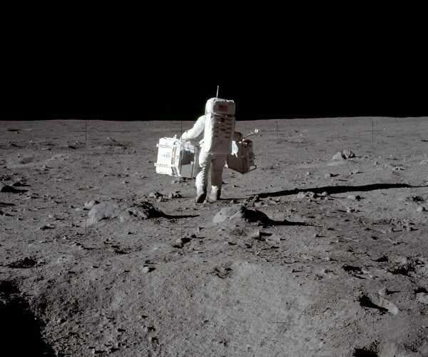 buzz aldrin walks on moon