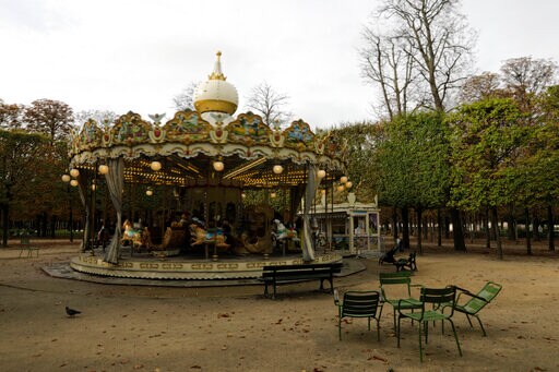 French Police Search Homes of Top Officials in Virus Probe