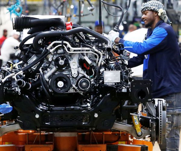 fiat chrysler automobiles assembly workers build ram pickup trucks.