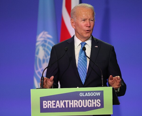 Traveler With Biden Tested Positive for Virus in Scotland