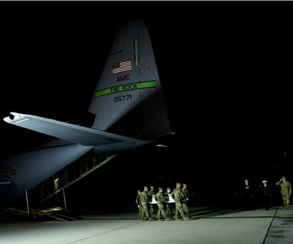 dignified transfer at dover air force base for sailors killed in pensacola naval base shooting