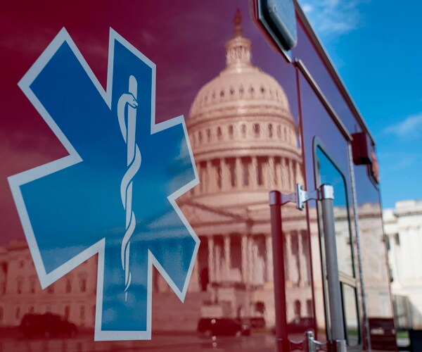 an ambulance parked outside the us capitol