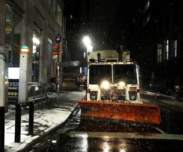 snow plow on manhattan street