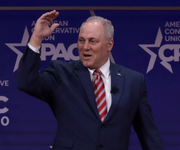 rep. steve scalise waves to the crowd at cpac