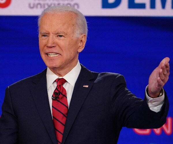 Biden Warns of 'Abuse of Power' in a Measured Trump Critique