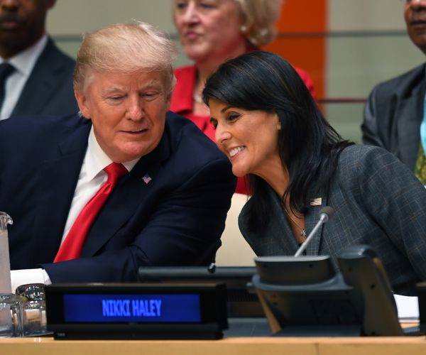 Trump's Shadow Provides Cover for Haley