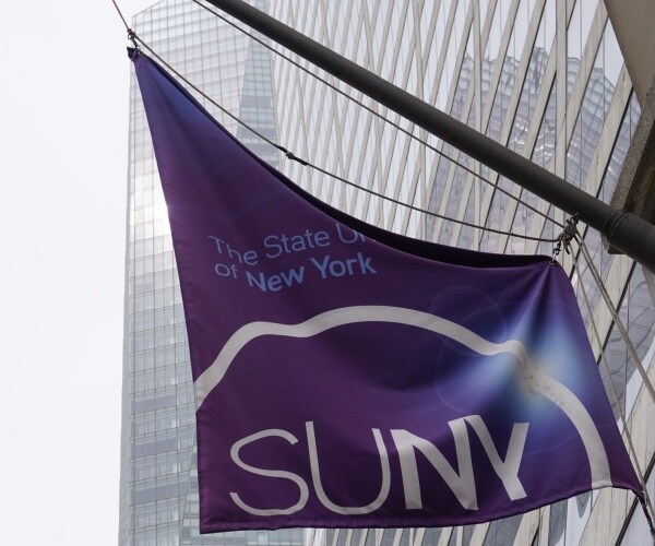 suny flag hanging outside a building