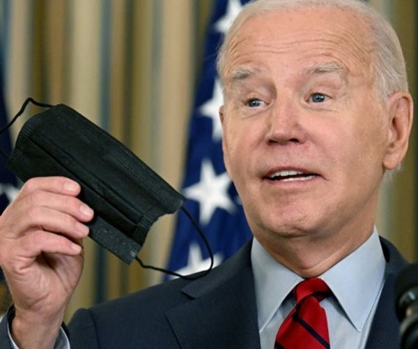 Maskless Biden Laughs Off COVID Guidance