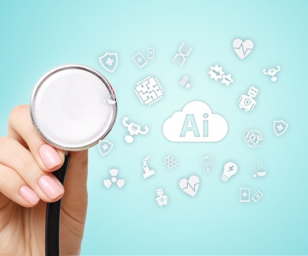 physician holding stethoscope up to screen that says AI