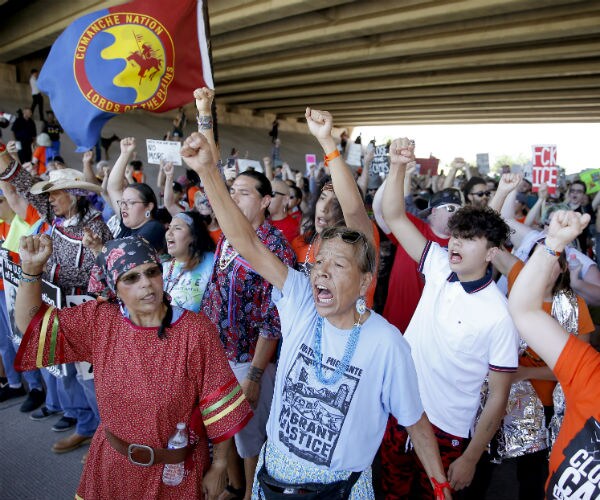 Plan Halted to House Migrant Kids at Oklahoma Army Base