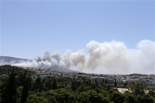 Firefighters Battle Blazes in Southern Greece, near Athens