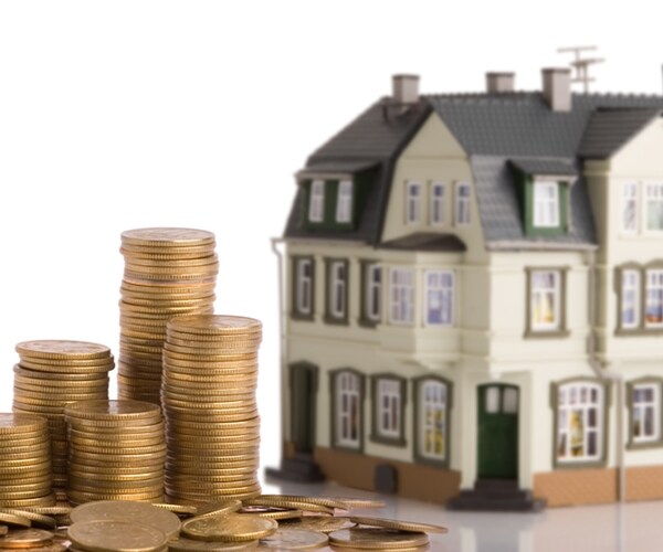 money for the house over white background 