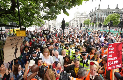 Police, Fire Heroics Prompt Anti-austerity Push in Britain