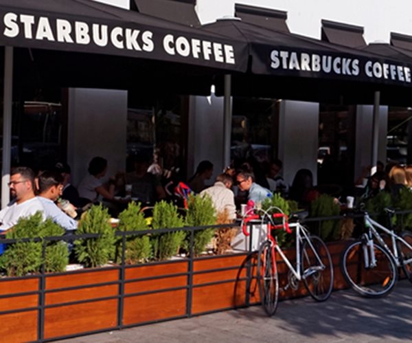 Starbucks to Close 150 Stores, Warns of Lukewarm Sales
