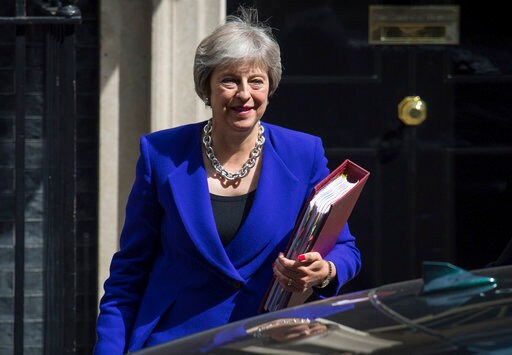 Lawmakers Confront May in Rowdy House of Commons Session