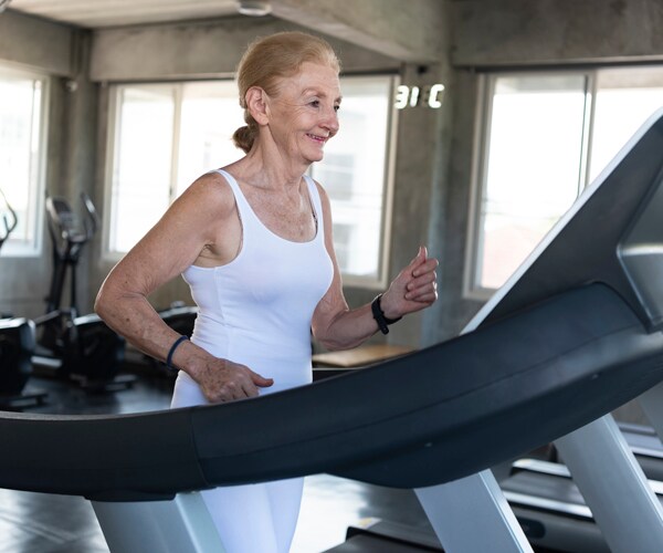 A woman running on a treadmill