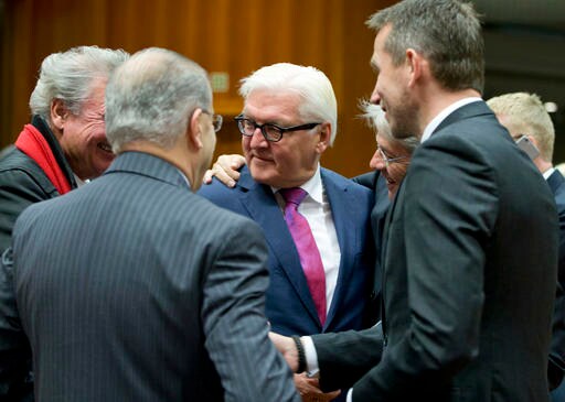 The Latest: Polish Minister: Trump Not Additional EU Trouble