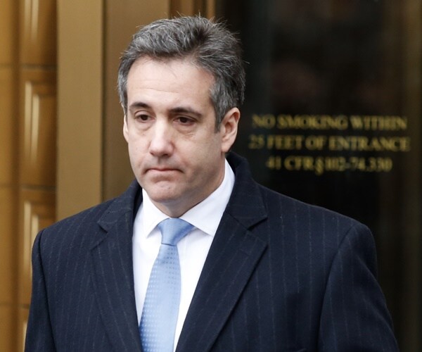 michael cohen exits a federal courthouse.