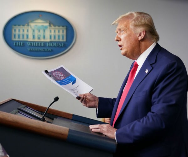 us president donald trump at a white house briefing on covid 
