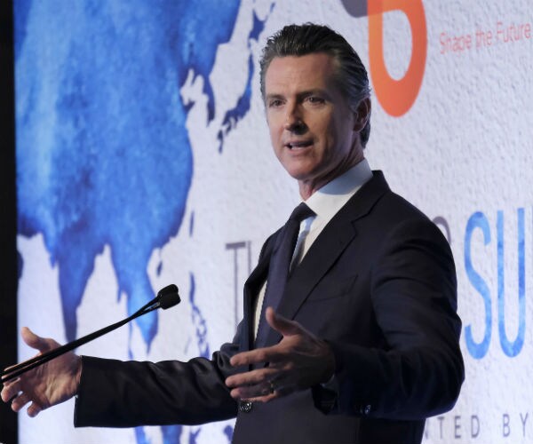 Gov. Gavin Newsom speaking at a podium