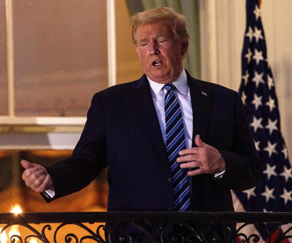 donald trump stands on the truman balcony at the white house