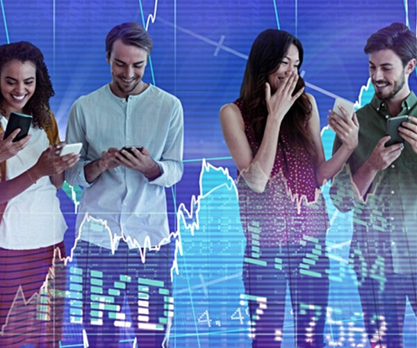 happy millennial co-workers team using smartphones against stocks and shares 