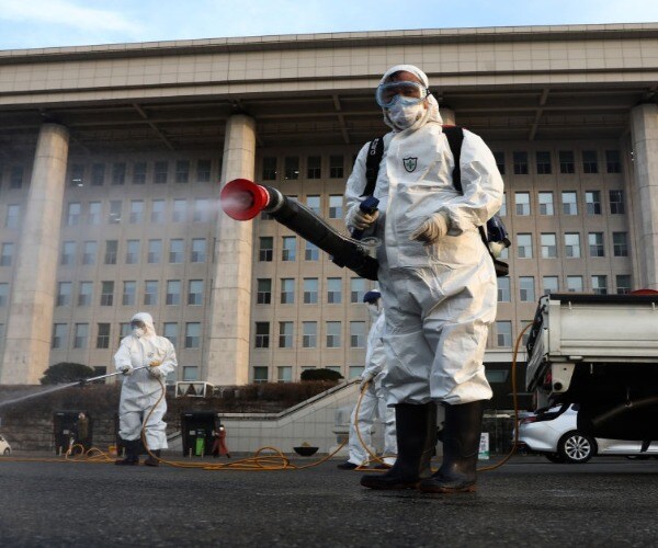 South Korea Virus Cases Jump Again; 1st US Soldier Infected