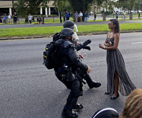 Woman in Powerful Protest Picture Identified as Nurse, Mother