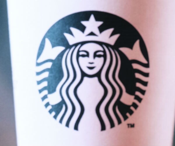 starbucks logo on a coffee cup