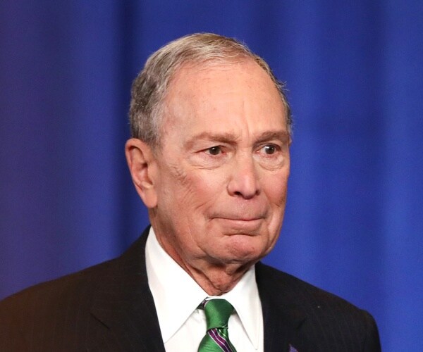 mike bloomberg looks on