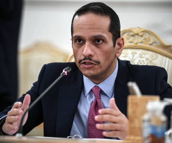 Sheik Mohammed bin Abdulrahman Al-Thani seated and speaking