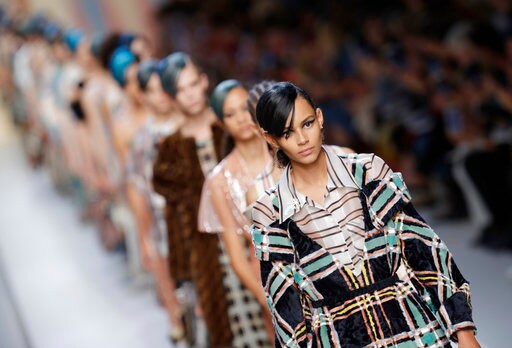 Milan Fashion Meets Global Crises with Lightness