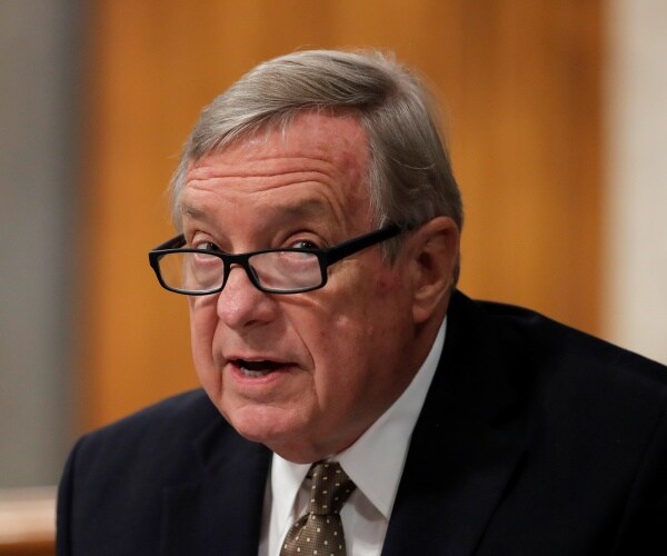 durbin in a suit and gray tie