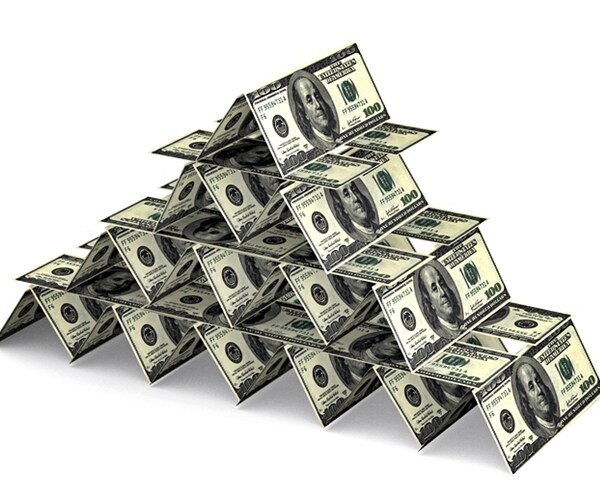 house of cards made out of 100 dollar bills 