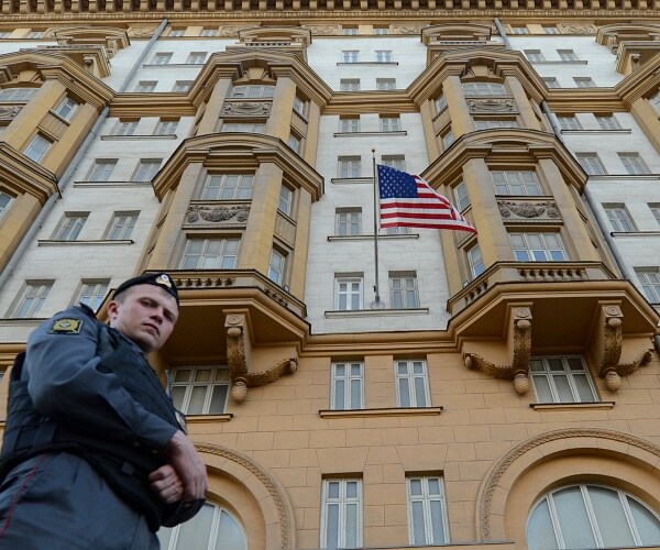 russian police office stands in front of us embassy