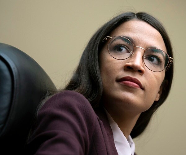 aoc attends a committtee hearing on capitol hill