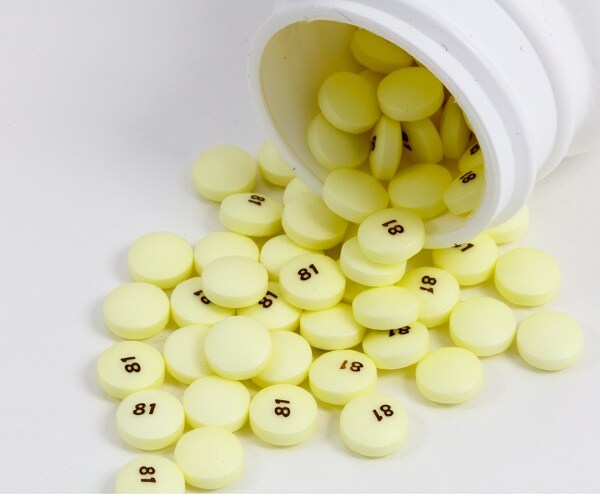 spilled bottle of baby aspirin