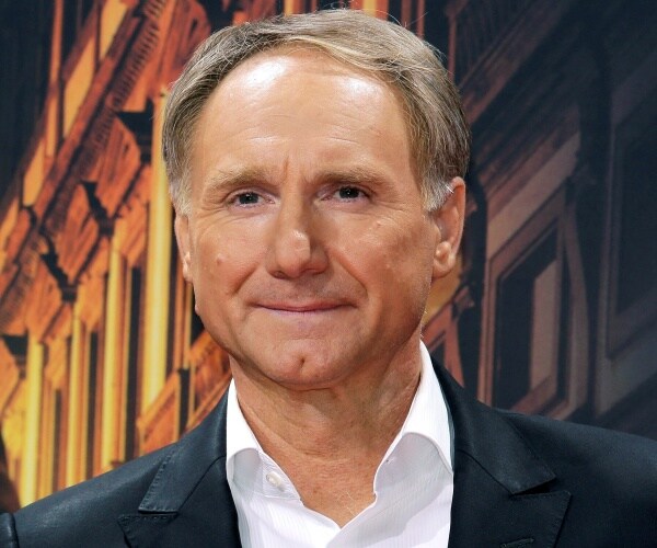 dan brown walks red carpet