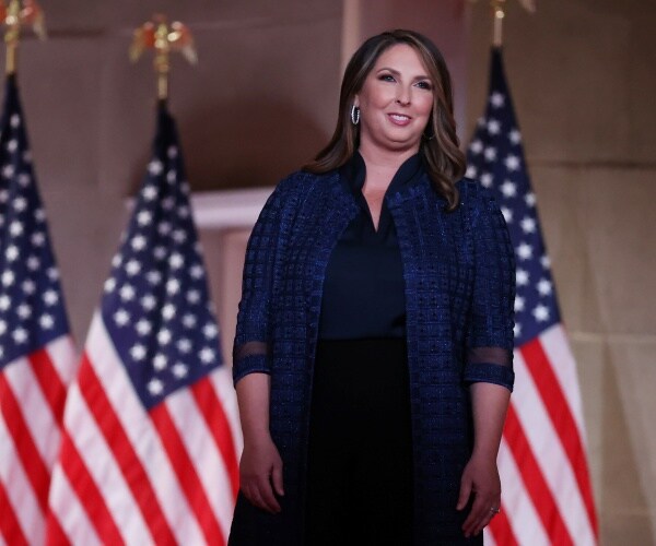 ronna mcdaniel stands on stage 