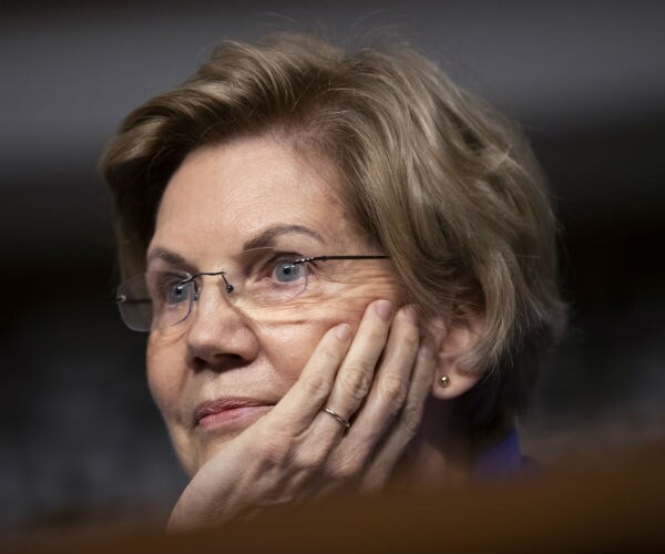 Senate Armed Services Committee member Sen. Elizabeth Warren, D-Mass., listens during a hearing on Capitol Hill 